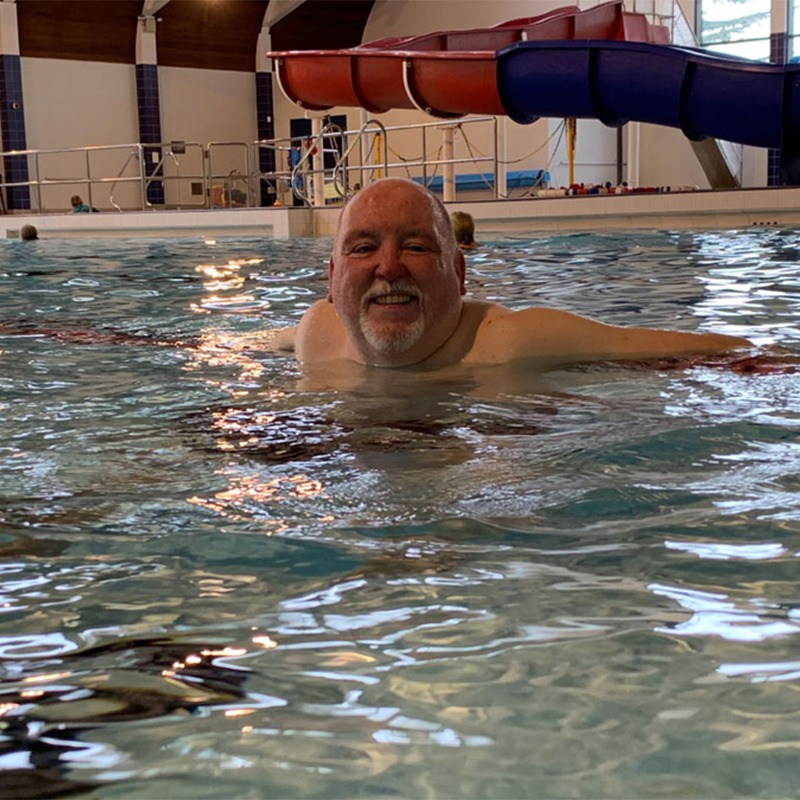 Swim_England's tweet photo. Steve Wright is one of thousands who’s health has improved thanks to regular pool time, however two of his local pools have now closed 🏊

He's worried about the impact this could have on him and many others. That’s why we’re saying #DontPutACapOnSwimming

More👇 #ValueOfSwimming