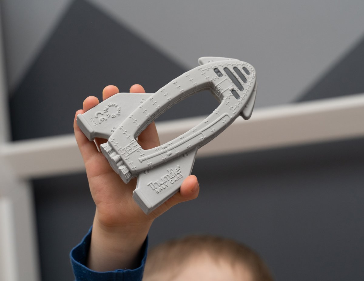 thethumble's tweet photo. @SpaceX Let's go @SpaceX ! Epic picture. Looks a little bit similar to our OrBITEr Natural Rubber Rocket Toy for babies or big kids too. Check out all 6 from our space toy range at https://t.co/muDg0ZbVXf #spacex #Space #NASA https://t.co/52oMr45Pzo