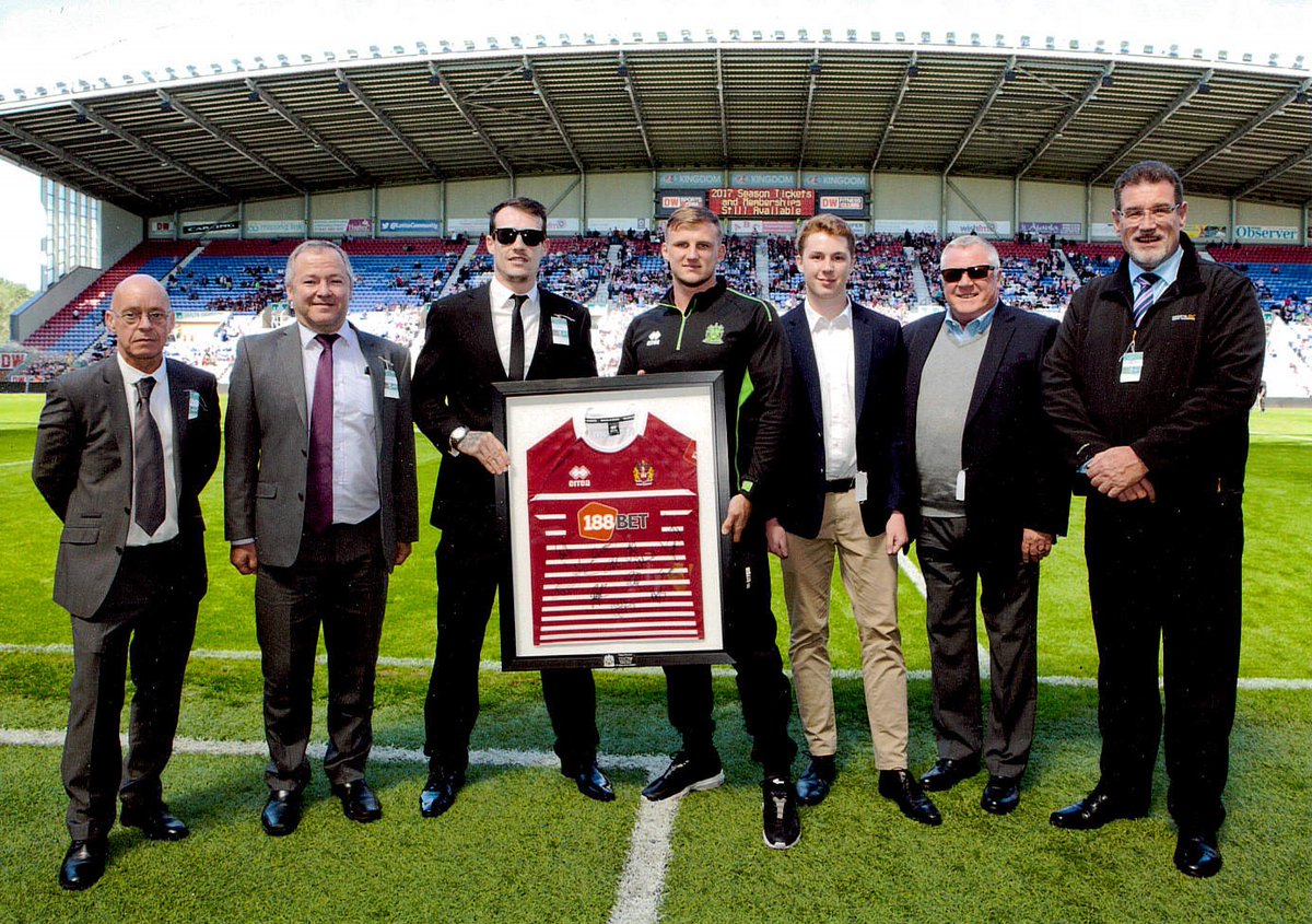 #Throwback to a fantastic day out at @WiganWarriorsRL when we were presented with a signed shirt from the team. Good luck in your penultimate @SuperLeague game against #CastlefordTigers @CTRLFC at @DWStadium tomorrow night gents!!