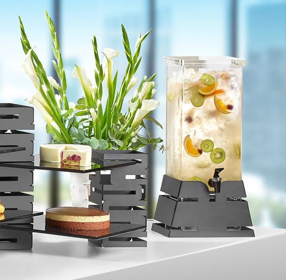 Keeping it cool 😎

Upgrade your buffet with the Rosseto® 4 Gallon Square Black Matte Pyramid Base Beverage Dispenser (LD140). <a href="/RossetoSolution/">RossetoSolutions</a> 

#stillsummer #buffet #grabngo #beveragedispenser #drinks #servingsolutions