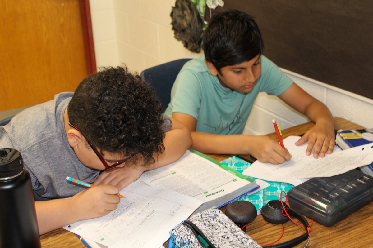 After presenting to their classmates, Ms. Kapler's students at Crossroads South completed a scavenger hunt to familiarize themselves with their social studies textbook.