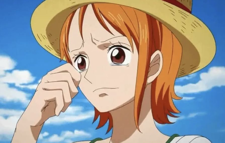 Hoy unos alumnos me dijeron que me parecía a Nami de One Piece. Colorada y depresiva si soy