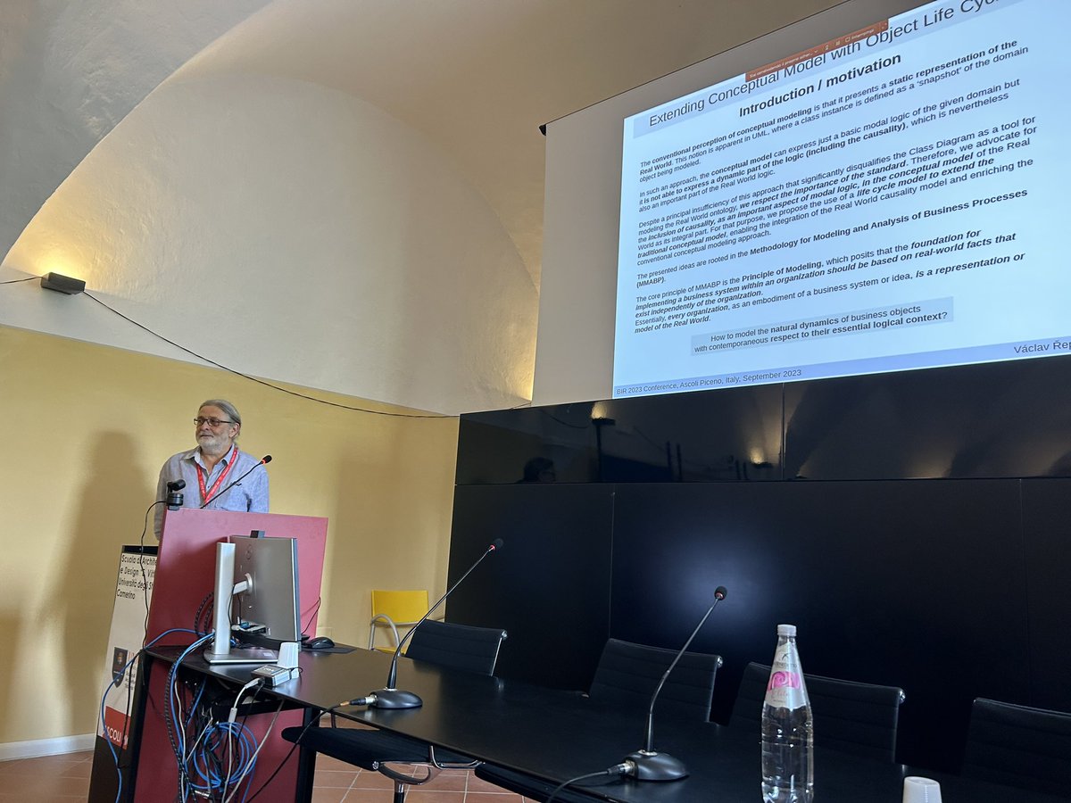 Václav Repa presenting the paper titled “Extending Conceptual Model with Object Life Cycles”.