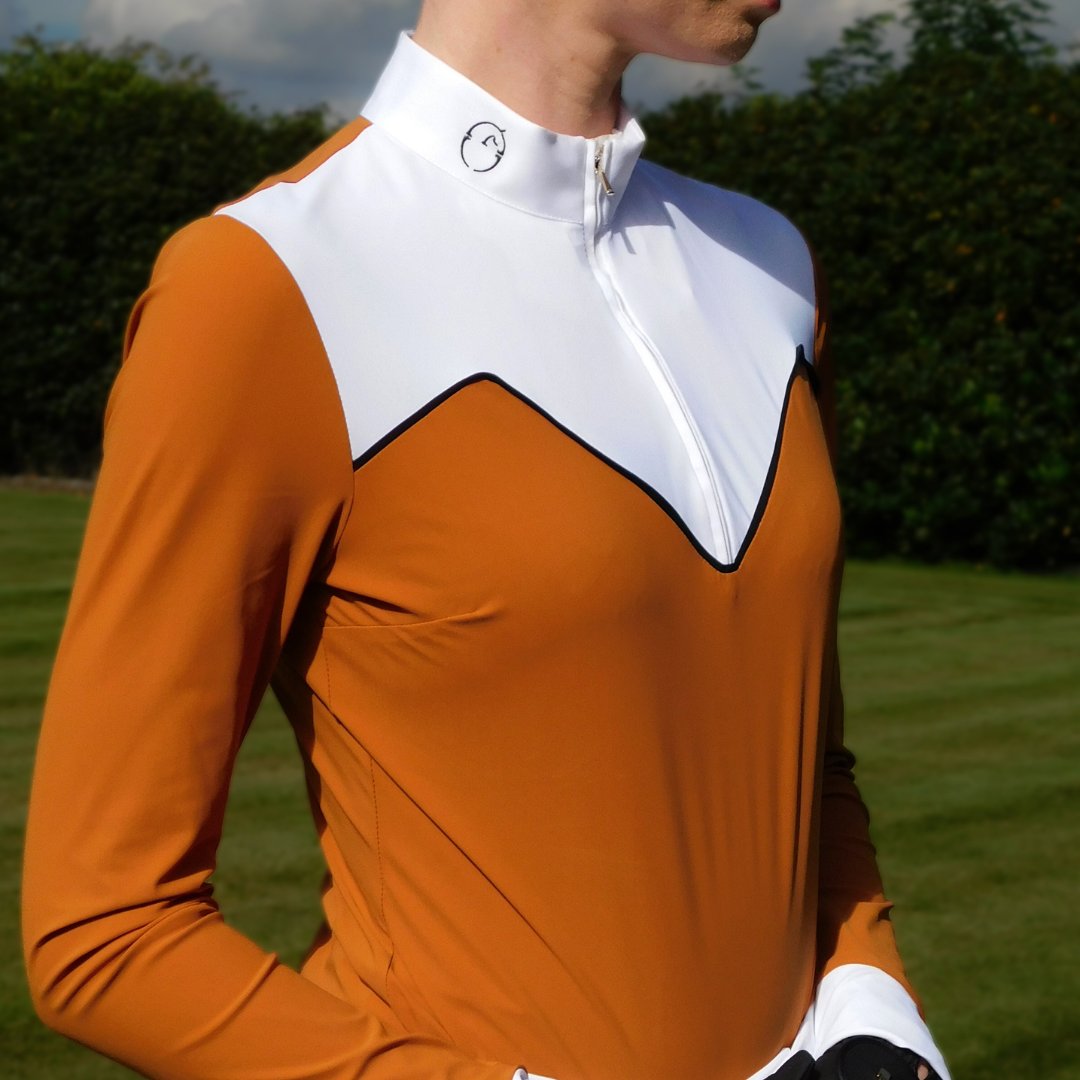 Turn heads with the stunning NEW✨ Chiavenna Show Shirt from Vestrum...

We are love with the stunning burnt orange Turmeric colour 🧡 of the new Vestrun Chiavenna Show Shirt. 

The perfect shade for elegant and eye-catching Autumn show style.

#Equestrian #Equiport #Vestrum
