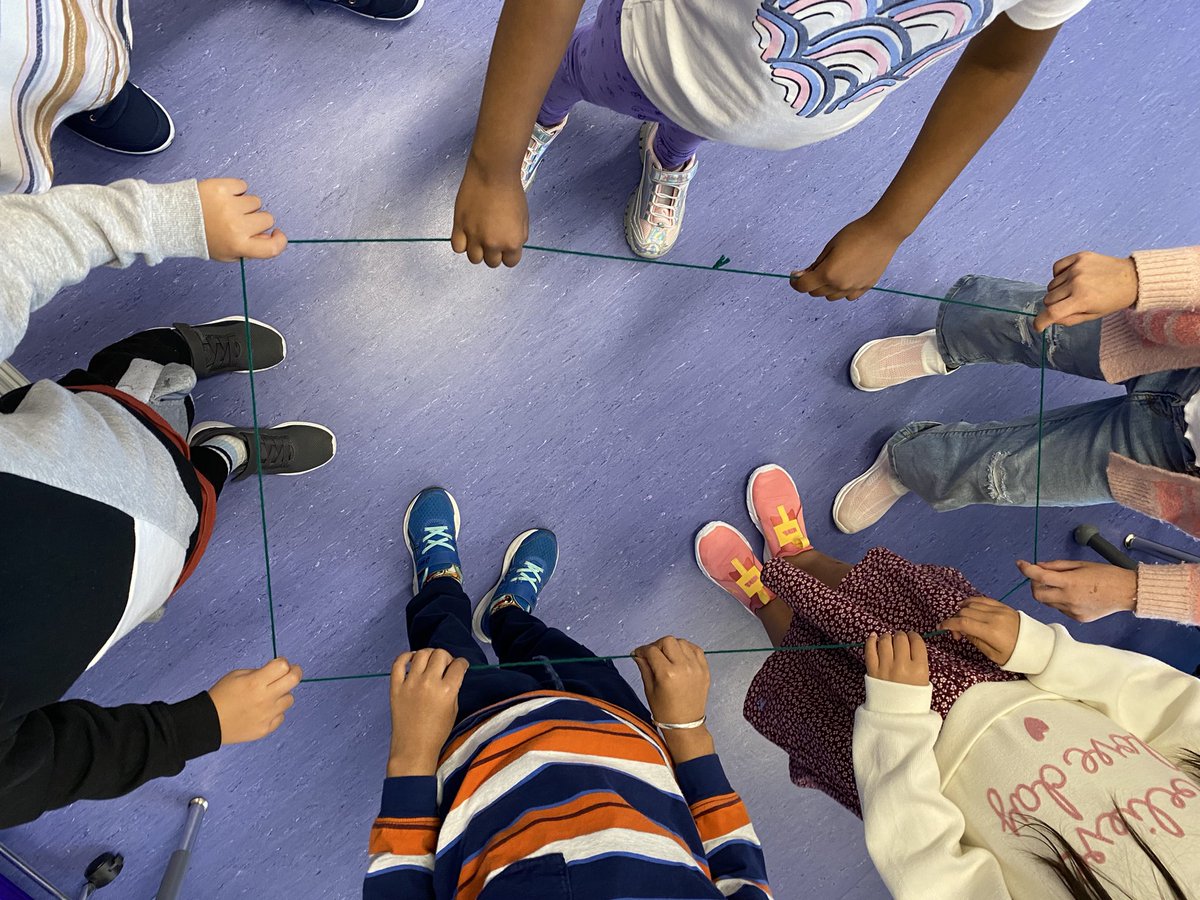 mrspaulitzki's tweet photo. We are building a math community by learning to talk about our ideas, listen to others, work together, and ask questions. Today, students worked in groups to make different shapes using a piece of yarn. Everyone had to be touching the yarn at all times. Awesome teamwork, 1A! https://t.co/0XDzou2D65