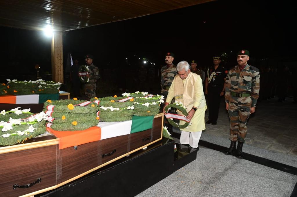 OfficeOfLGJandK's tweet photo. Paid homage to brave sons of Maa Bharti, Col Manpreet Singh and Major Aashish Dhonchak, who made the supreme sacrifice in an anti-terror operation in Anantnag. My deepest condolences to their families. The grateful nation will forever remain indebted to the bravehearts. https://t.co/ezryoipenB