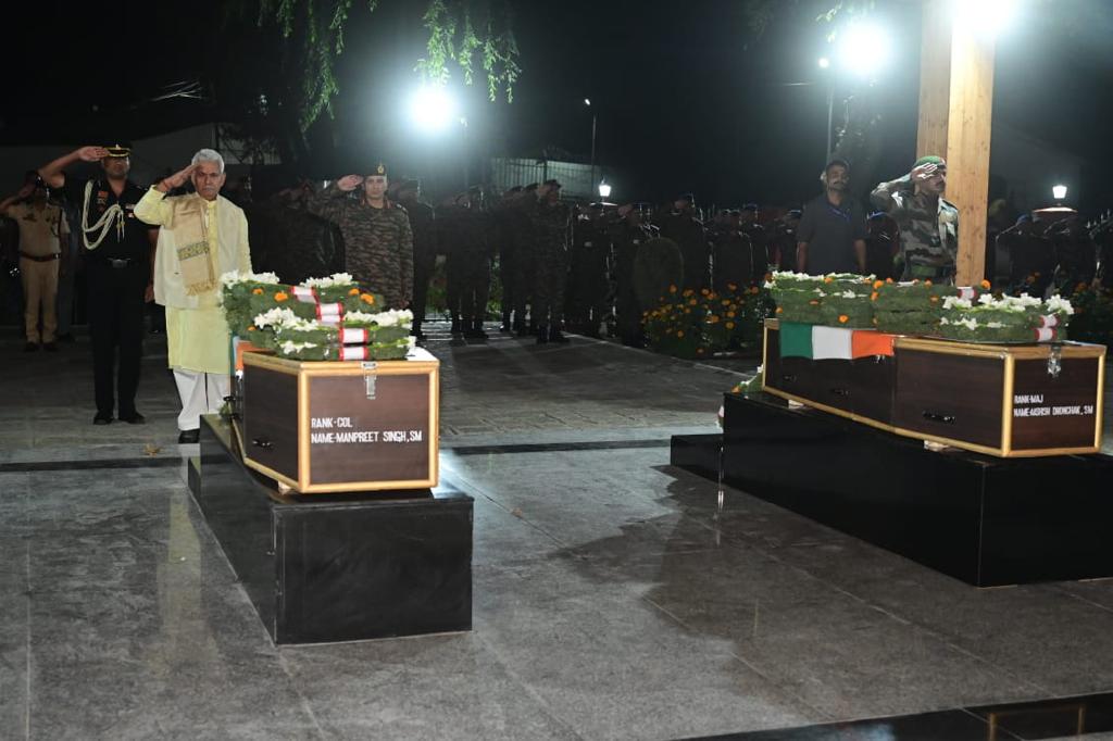 OfficeOfLGJandK's tweet photo. Paid homage to brave sons of Maa Bharti, Col Manpreet Singh and Major Aashish Dhonchak, who made the supreme sacrifice in an anti-terror operation in Anantnag. My deepest condolences to their families. The grateful nation will forever remain indebted to the bravehearts. https://t.co/ezryoipenB