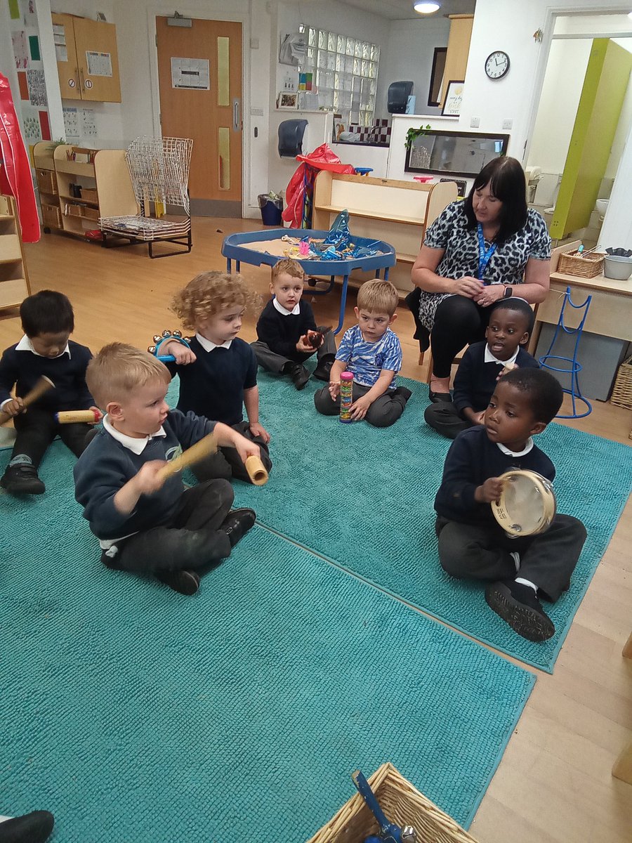 BPSHull's tweet photo. NGS have enjoyed their first music session. We explored the different sounds the instruments made by tapping, shaking and scraping.  We practised playing them fast and slowly and stopping when Mrs Scott signalled to do so. #BPSEYFS #BPSMusic https://t.co/rULh5tA8Uv