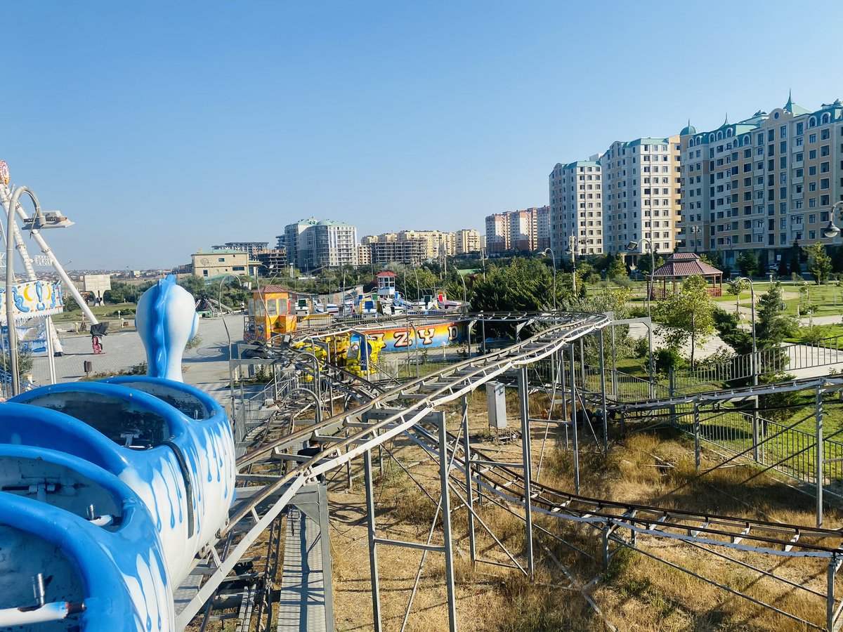 CoastersWide's tweet photo. Nasimi Park is located in Azerbaijan’s second largest city Sumqayit. 31 kilometres away from the capital along the Caspian Sea, the city is well connected by train from Baku. The Big Apple coaster here has a dragon themed train. #RollerCoaster #AmusementPark #WWCOnTour #CredLife https://t.co/7na5hVZXF5