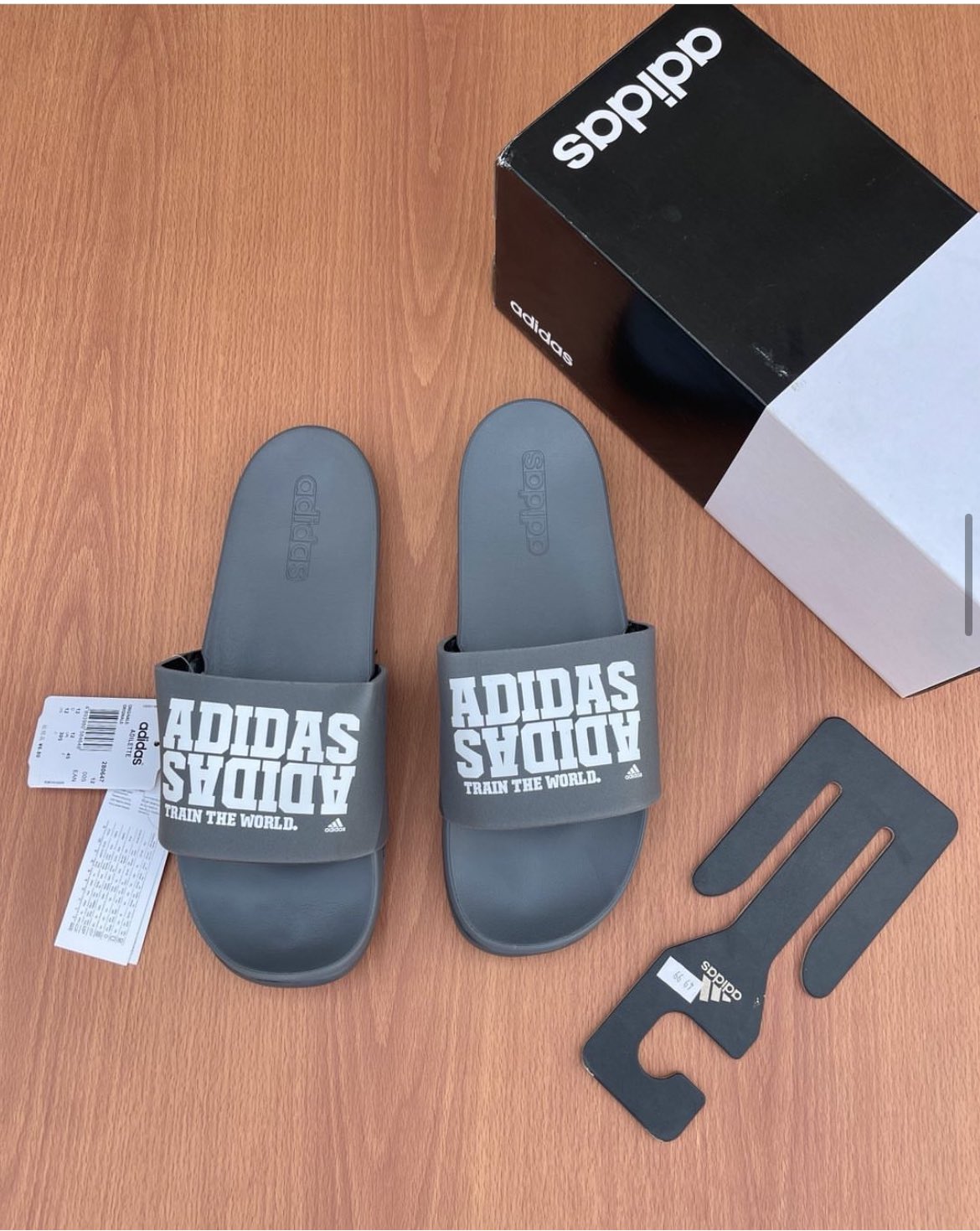 Adidas train the world slides sale