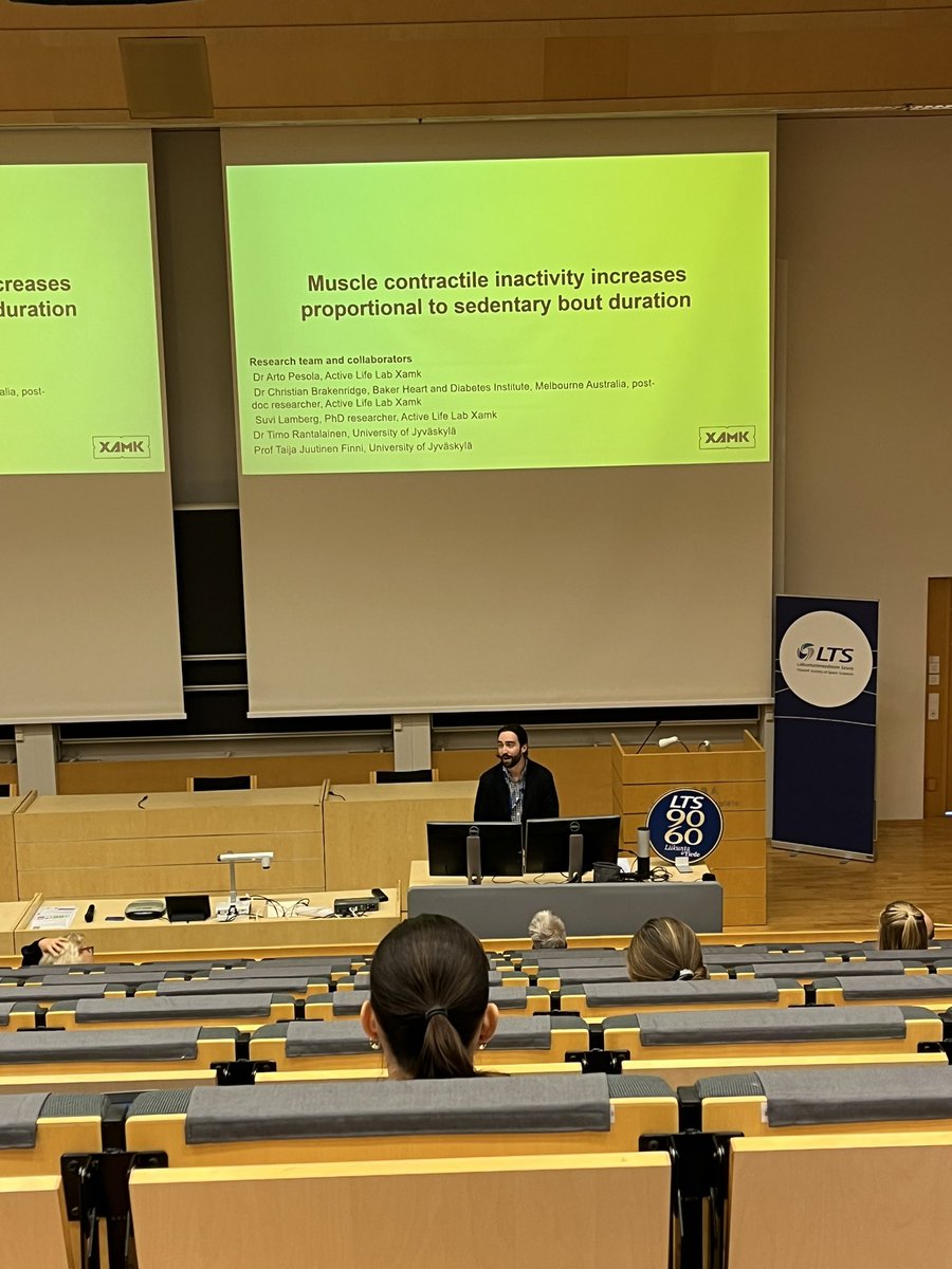ArtoPesola's tweet photo. @ChristianBrak on stage presenting some preliminary yet very interesting insights on sedentary bout muscle activity @ltsfi #LTP23 . The longer we sit, the more inactive our muscles are. @xamkfi #ActiveLifeLab @TaijaFinni @SuviLamberg https://t.co/VxOF1hVgYe