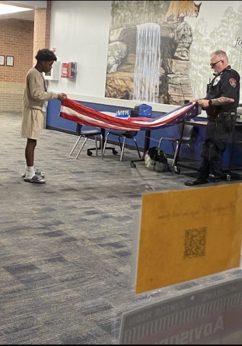 KellyBrod6's tweet photo. Day 14 - Today I am thankful for our campus officer.  He went out of his way to help one of our students by teaching him how to fold the flag from our flagpole.  Very cool moment!  @katyisdpolice Go Bobcats!  #watchmmjhlead https://t.co/AXIDdw0IRk