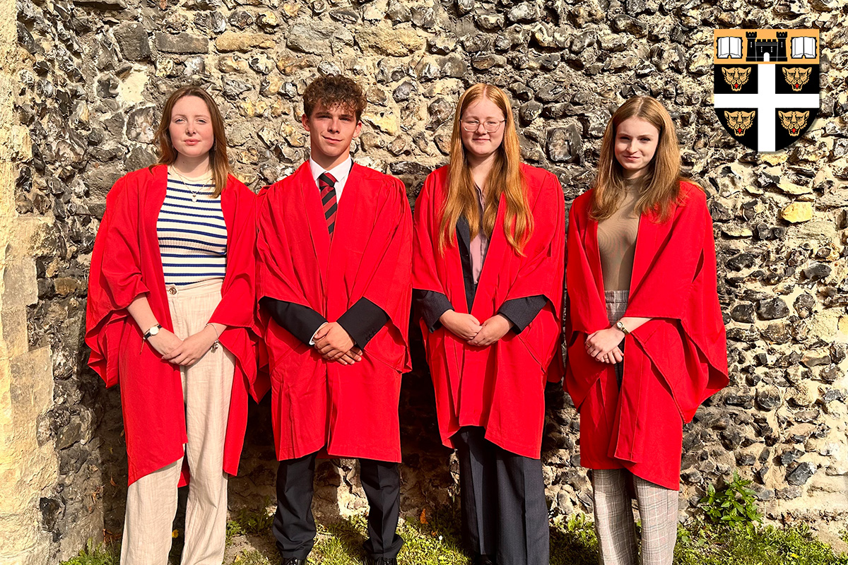 DoverCollege's tweet image. Yesterday morning, we were delighted to welcome back last year's Heads of School, Gabriella and Louise. In assembly, they presented red gowns to our new Heads of School, Grace and Seb. #PassingTheBaton