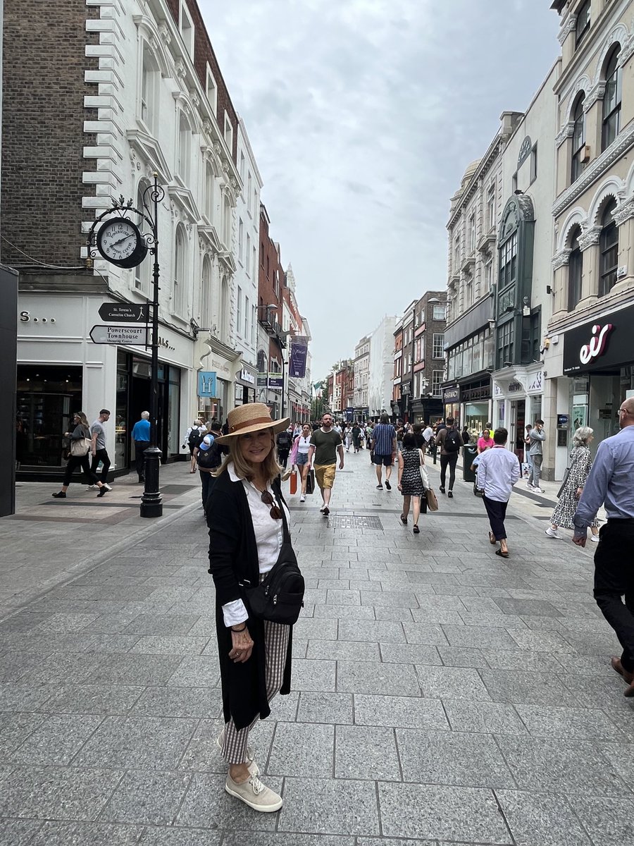 revmahoney's tweet photo. While we are recovering from being deported from Italy, Katie getting some “Healing Irish Vibes” on Grafton St. In Dublin. #IrelandRocks #DublinBaby https://t.co/R0CjKfgpP7