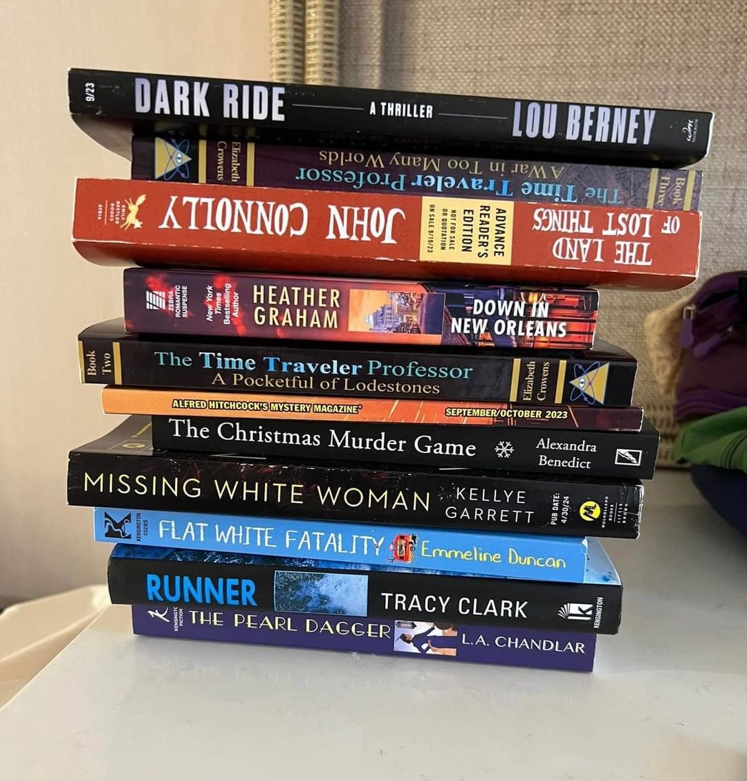 ECrowens's tweet photo. Two of my #timetravel #novels #books in #cynthiawestbrook's #bookpile #bookhaul @bouchercon2023 @bouchercon #bookroom #bookseller #mystery #mysteryconvention https://t.co/yDRbQMuThD