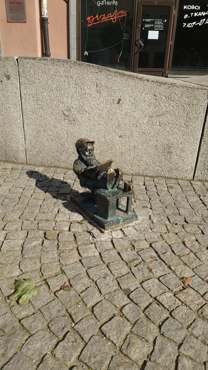 Some of the famous Wroclaw dwarves dotted around the city centre. Symbols commemorating the old anti-Soviet movement from years ago @talkSPORT