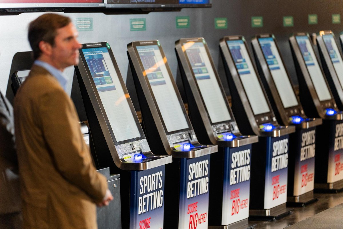 AndyBeshearKY's tweet photo. I just placed the first legal sports bet in Kentucky!

Today, I took the OVER on UofL and UK football wins, and of course the UNDER on Duke. But my bigger bets are on the future of this Commonwealth! https://t.co/U8eVzDQbuR