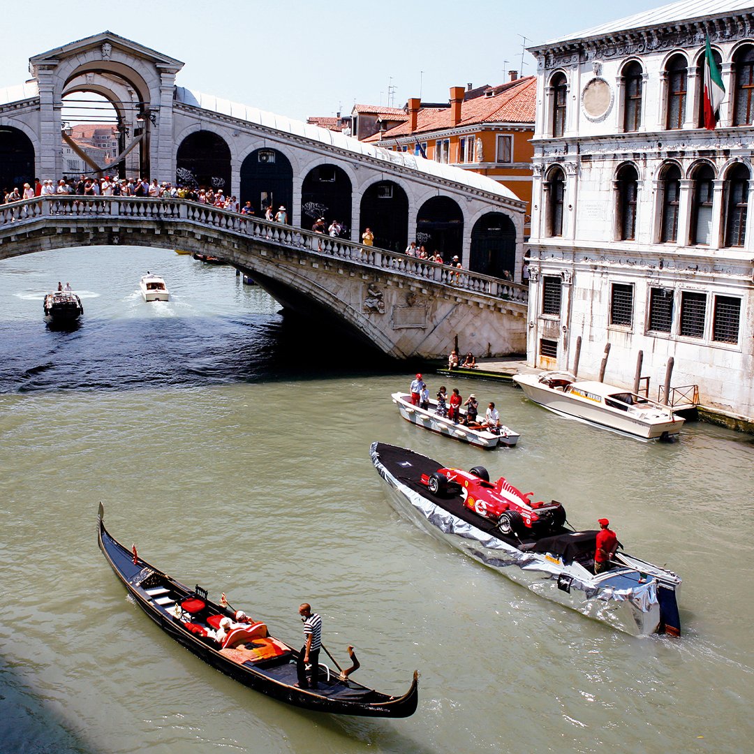 MuseiFerrari's tweet photo. We've been watching celebrities cross the Grand Canal for the #VeniceFilmFestival, but are we the only ones reminiscing about when the #FerrariF2002 did it?

#MuseiFerrari #Ferrari https://t.co/djwyN3cX3A