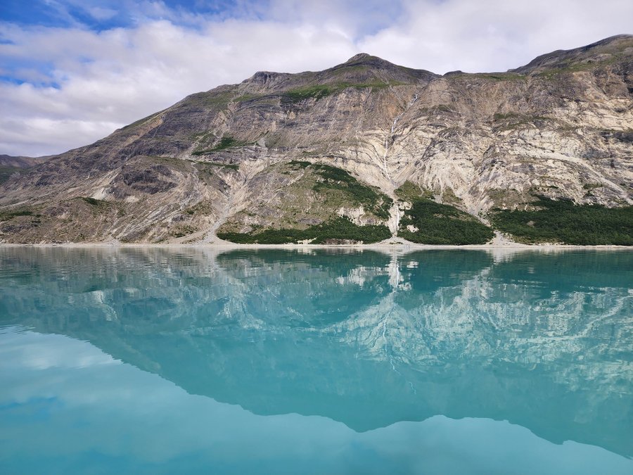 Glacial silt in Glacier Bay National Park, 2022. Glacial silt in coastal waters increases marine alkalinity, enhancing ocean carbon storage.  (Image credit: NOAA/Univ. of Washington).
