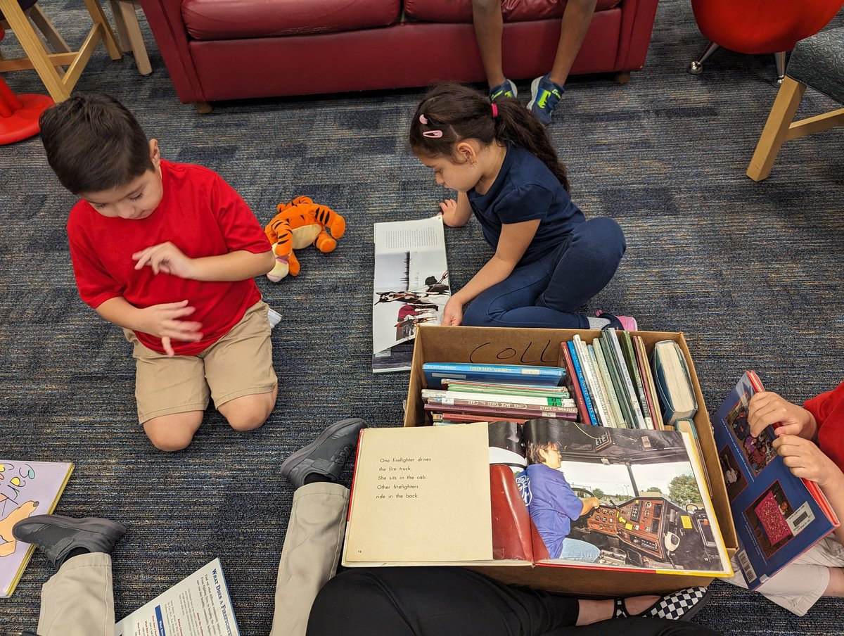 SeriouslyHarris's tweet photo. Reason # 373646373836 to love @collins_library !  Our REACH students had a nice calm 10 minutes practicing how to handle books before our check out!  #Collinsonamission #alieflibraries https://t.co/AuzPH5OPFs