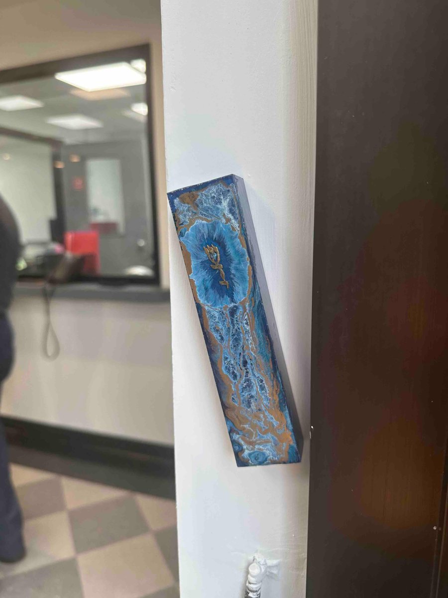 Rabbi Gideon Estes and Rabbi Masri ceremoniously hangs the mezuzah on the doors of our brand-new Celebration Company West location. As the mezuzot grace the doorways, we are reminded of the rich tapestry of faith and community that binds us together.