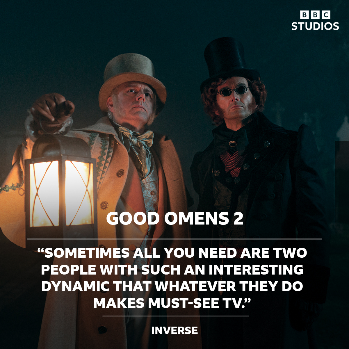 Composite image featuring a photo of David Tennant as Crowley and Michael Sheen as Aziraphale in Good Omens 2, both are dressed in Victorian clothes. Across this is a BBC Studios logo and the quote: ““Sometimes all you need are two people with such an interesting dynamic that whatever they do makes must-see TV.” – Inverse”.