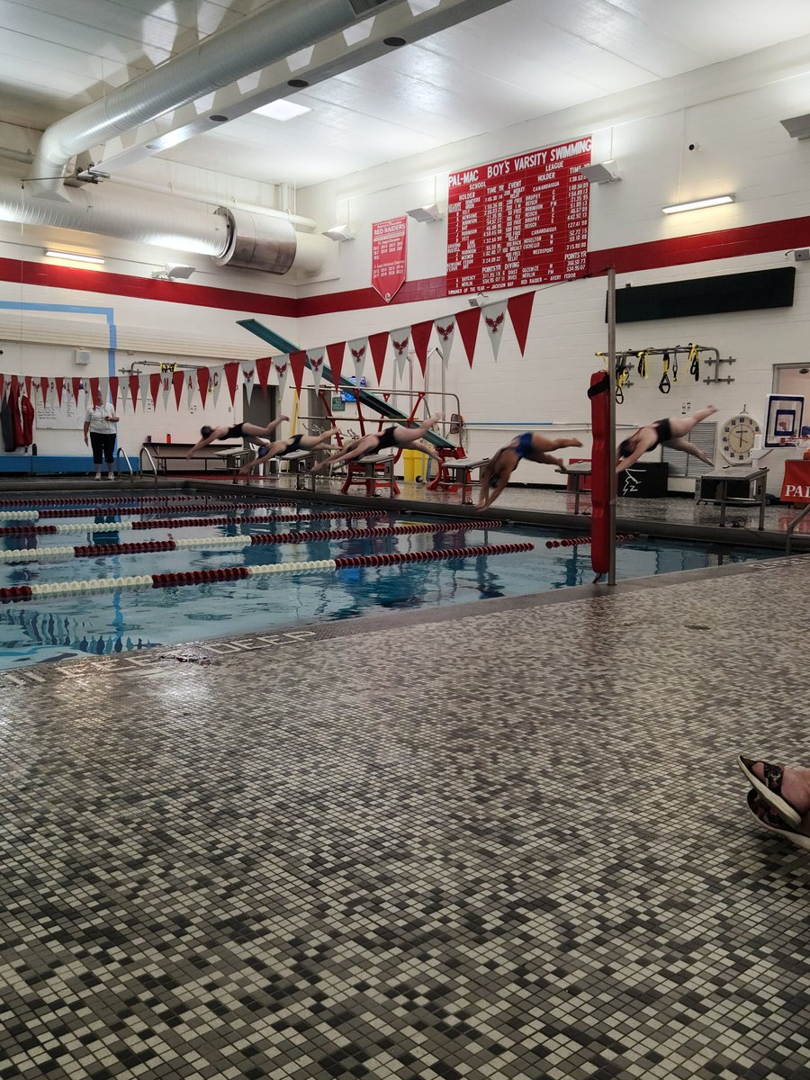 Pal-Mac swimmers leading 36-31 in the home opener against Midlakes.