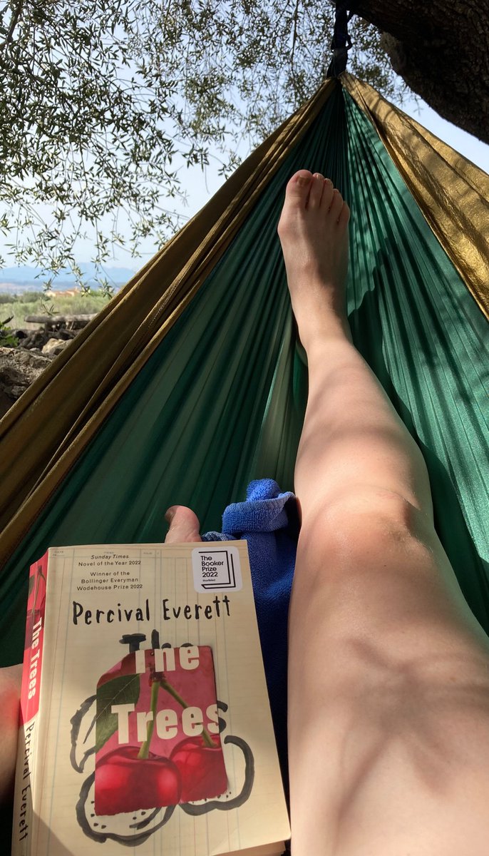 Found the perfect spot with dappled shade under the trees to put up my hammock and read this incredible book #TheTrees #PercivalEverett