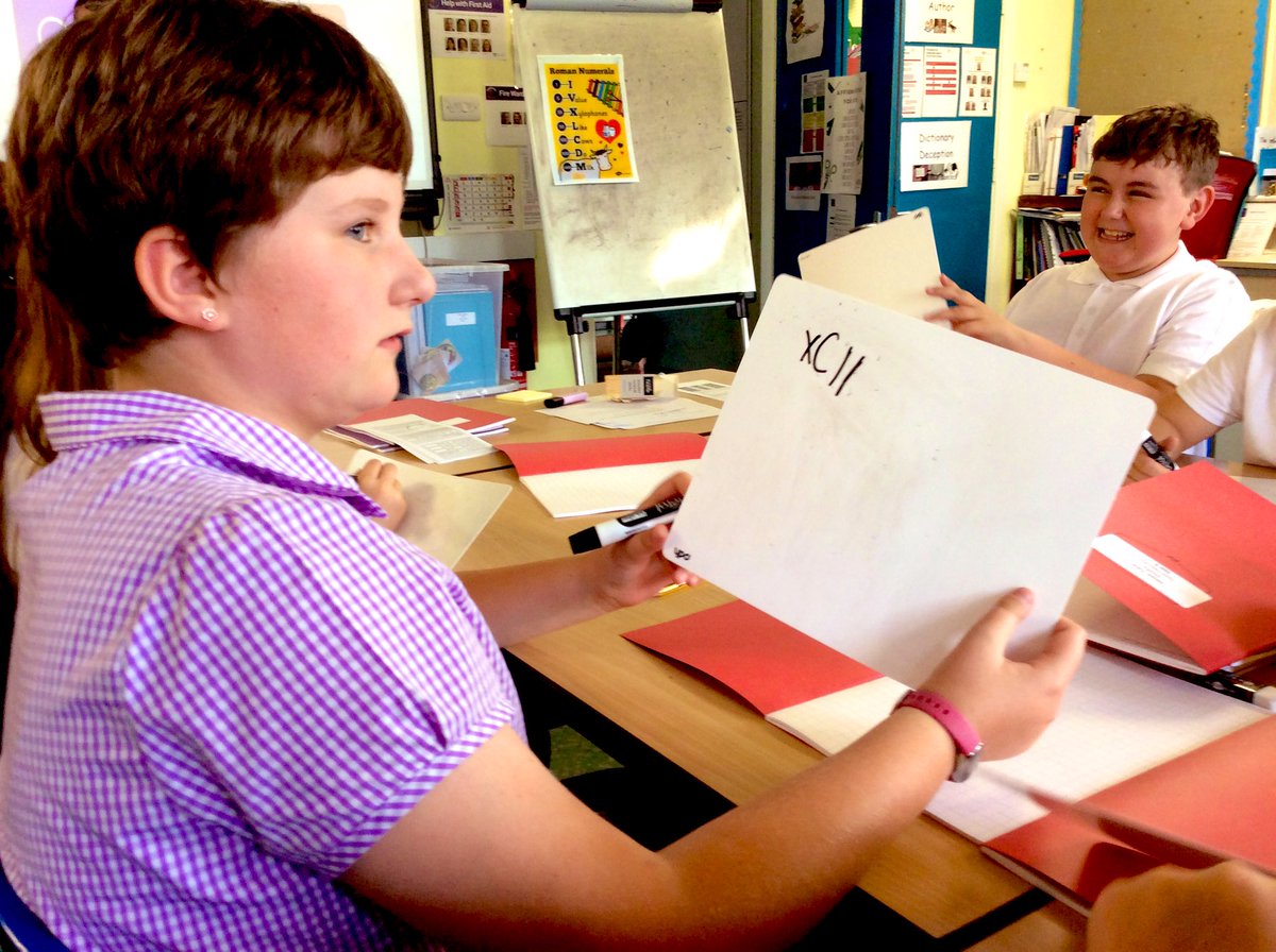 TadPrimaryAcad's tweet photo. Team Neptune working on Roman Numerals at the beginning of the school year. Some of us prefer to create them with cocktail sticks; others used white boards. A good code breaking challenge but next step 21st century maths! @eboractrust #TadcasterMaths @gareth_metcalfe https://t.co/Nn5ArbZb6o
