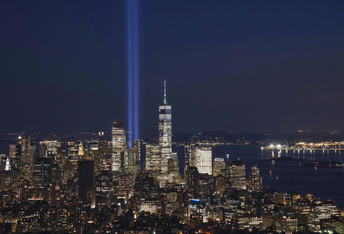 GaryHershorn's tweet image. A comparison of lower Manhattan displaying the Tribute in Light in 2003 for the 2nd anniversary of 9/11 to last night as the 23rd anniversary approaches seen from the Empire State Building #newyork #newyorkcity @Sept11Memorial #tributeinlight @empirestatebldg @agreatbigcity