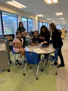 ACHS students checking out books in our beautiful new library! #ACHSPride