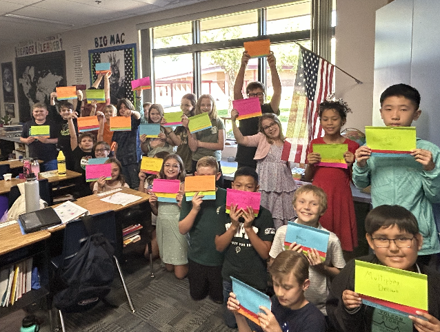 We Love Math...5th grade loving their new bright flip books for multiplying decimals!!! Hands on learning everyday...all day!