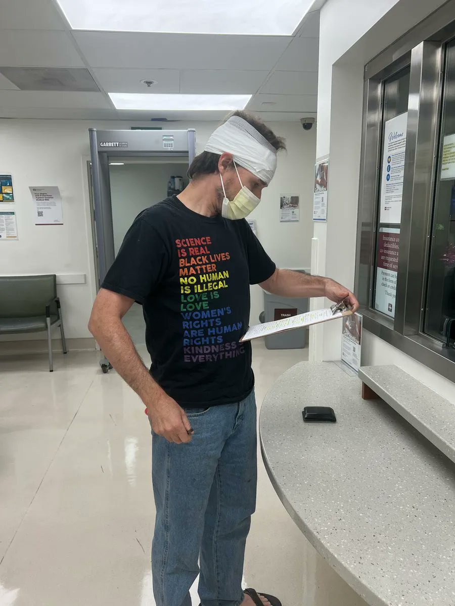 tracewoodgrains's tweet photo. Last month, social media celebrated this viral video of a beach assault as a triumph of the "punch a Nazi" ethos. The victim? A "Bernie Sanders democratic socialist" wearing this at the time of the assault. I spent weeks diving into the backstory. 1/x https://t.co/5rJTTbQjCw https://t.co/3GUAaxf7qf