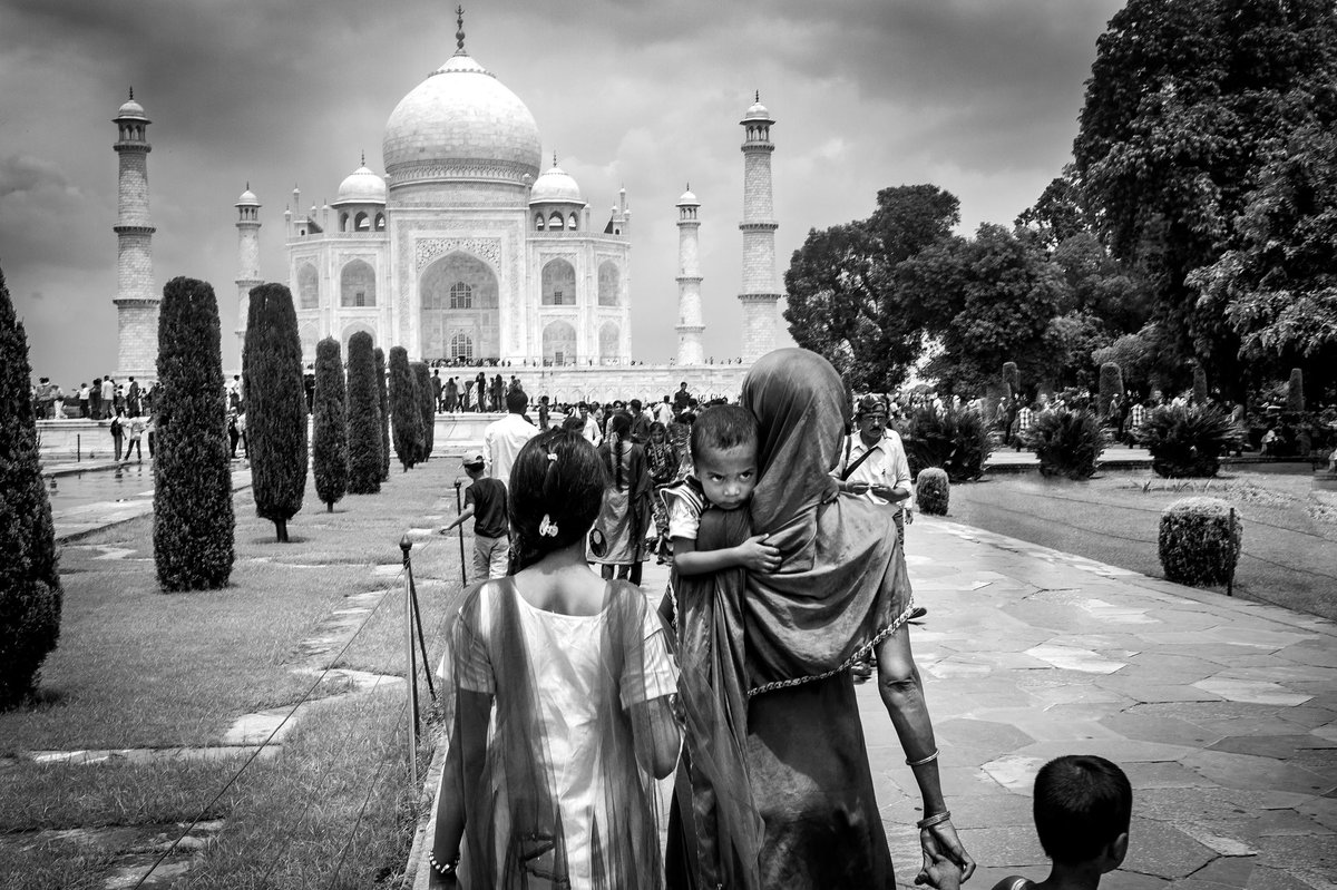 marcoramin's tweet photo. Taj Mahal, Agra, India - A lady on a pilgrimage to Agra visits this splendid architectural masterpiece with her three children on a hot summer day. The Taj Mahal, known as "the crown of the palace," is one of the most iconic monuments in the world. #tajmahal #motherhood https://t.co/ZuSuZJfeqV