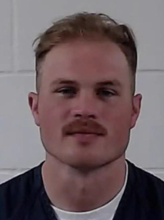 Zach Bryan mug shot/thirst trap.