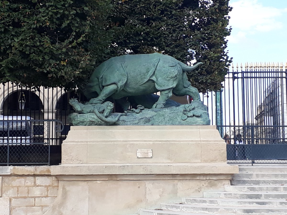 IanMundell's tweet photo. Victim-blaming in Art, part 47: this statue in the Tuileries by Auguste Cain is called "Rhinoceros Attacked by a Tiger"... https://t.co/pUdNaAjuwV