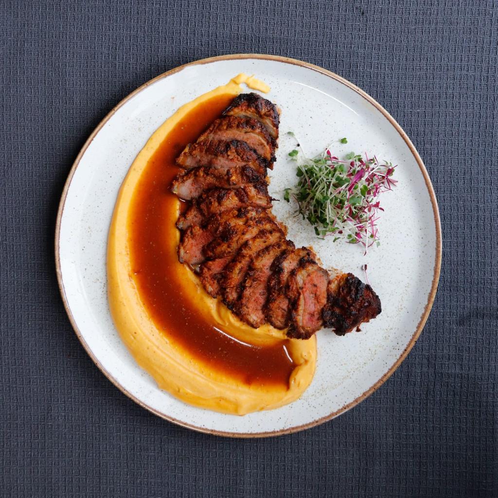 PureCooking's tweet image. Experience a burst of flavors with our Tandoori Duck! Barbary duck breast with spiced apricot chutney and tamarind sauce - a delightful journey for your palate. 🦆🌶️ #Pureindiancooking #TandooriDuck #DuckDelights #FlavorfulFusion