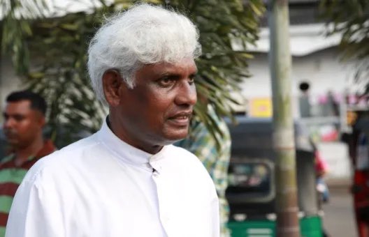 kumanan93's tweet photo. "SL Army is directly carrying out land occupation and #Buddhistization in the North&East provinces along with the Department of Archaeology, and the Sinhalese Buddhist monks are carrying it out with and without the support of the SL army. They should also be identified as government paramilitary units." - 
 
Rev. Fr. M.Sakthivel said