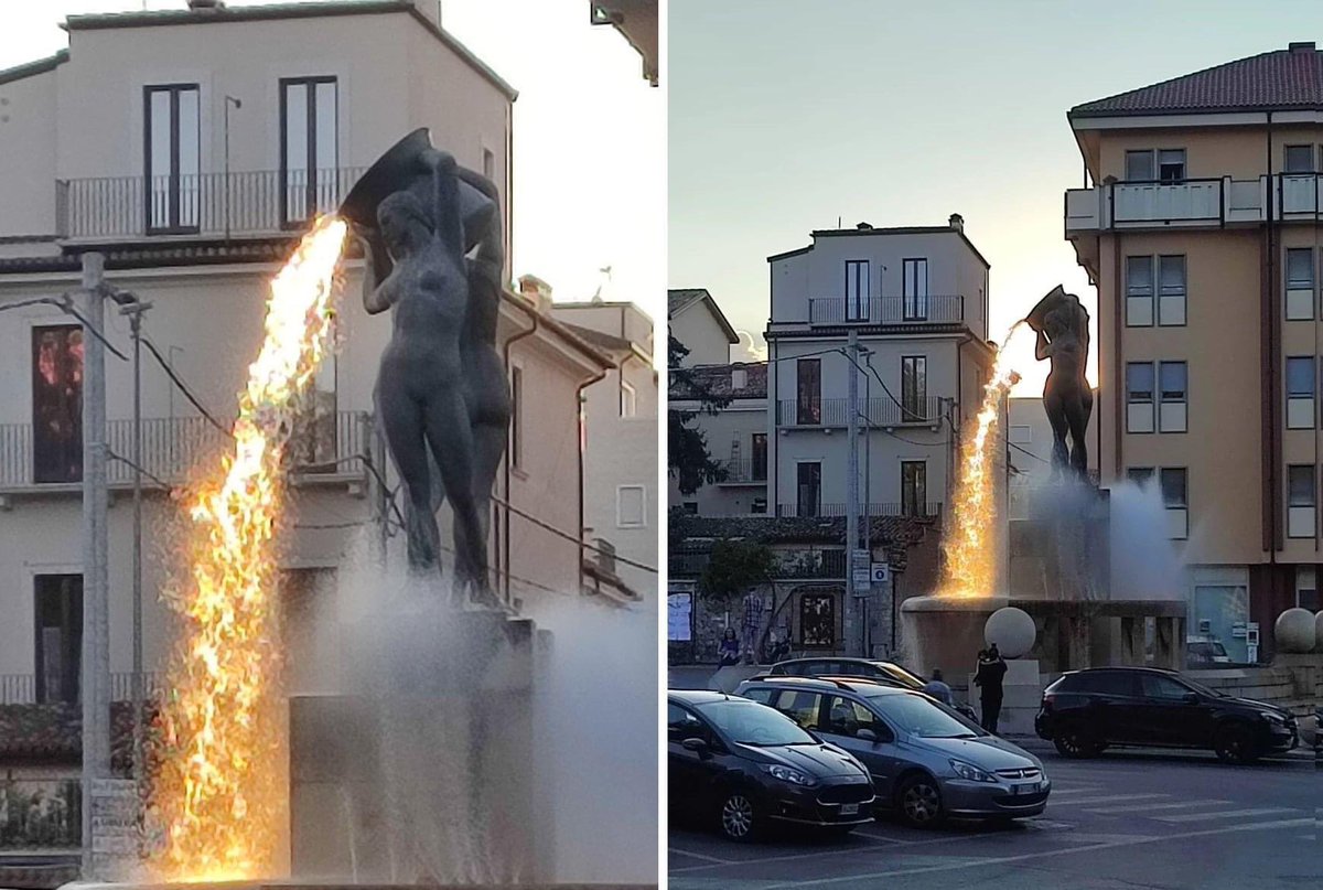 HowThingsWork_'s tweet photo. At a certain time of day when sunlight filters through the gap between two buildings, the fountain in L'Aquila, Italy will look as if the statue is pouring fire from the sky 🔥🇮🇹 https://t.co/3Ausc0FVtK