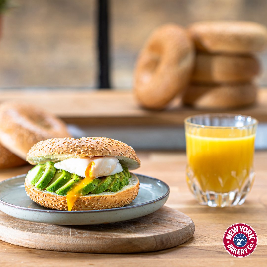 Start the day sunny-side up with an eggcellent avocado bagel! 🍳🥑☀️