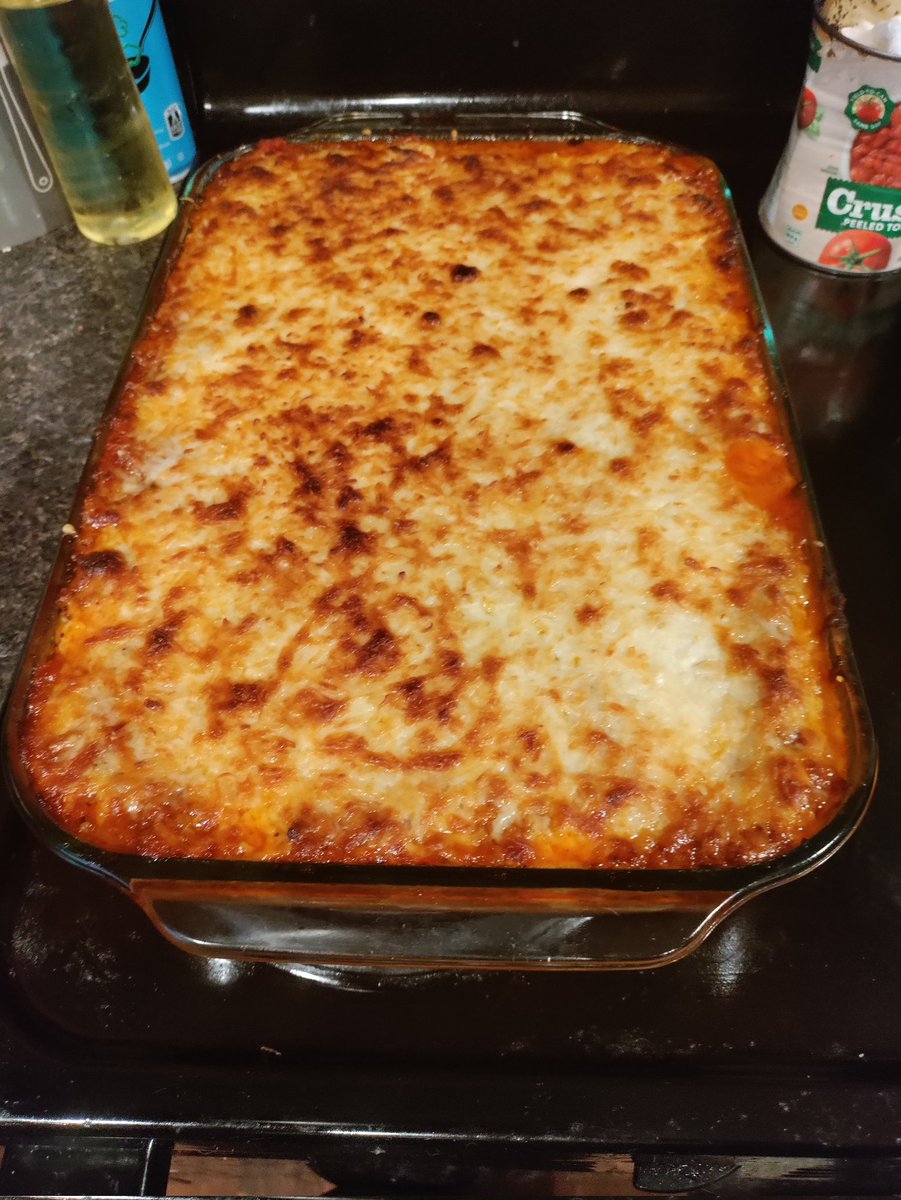 gothscorpion's tweet photo. First time making lasagna! 
Went with eggplant lasagna recipe
My son says I hit it outta the park...orbit 😁
This from the dude who looked at me as if I was blaspheming every deity when I suggested to try making it with eggplant instead of pasta

He's eaten most of the pan. 😆 https://t.co/PkEqyLMRar