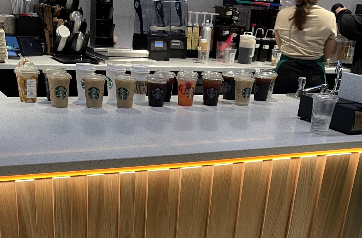 Vinnie_VdK's tweet photo. To the generous soul who’s clearly done a team coffee order from the new Starbucks on Shoreditch High Street, please tip your delivery driver well. Just saw the poor sod trying to work out how one human can possibly transport over 20 drinks. https://t.co/YcrOer085d