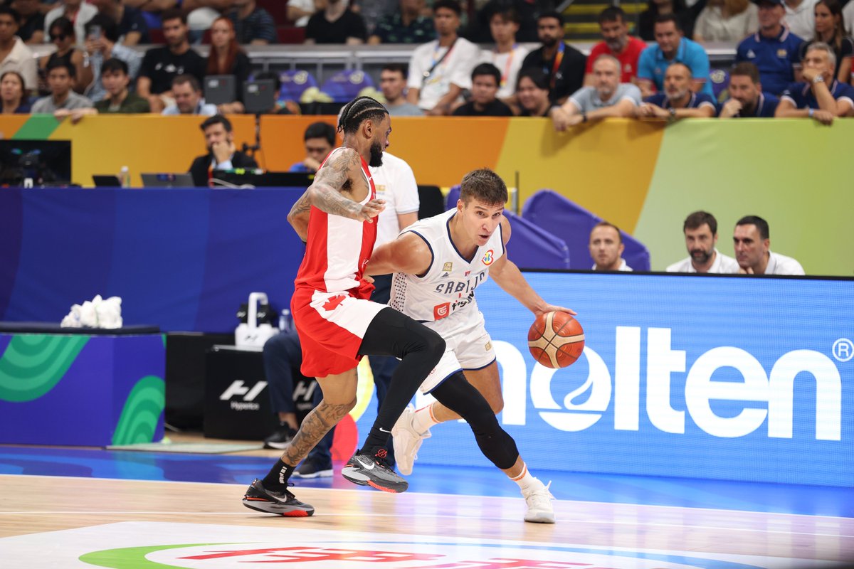 NBA_Indonesia's tweet photo. Salut untuk #BogdanBogdanovic dan kawan-kawan yang udah nunjukin permainan maksimal mereka 😱🎉👏🏼
#TimSerbia memang pantas melaju ke Final 💪🏼
#FIBAWC x #WinForAll #NBA #NBAIndonesia #BasketballEvent #BasketIndonesia #Canada #Serbia https://t.co/OXPHj3AEJG