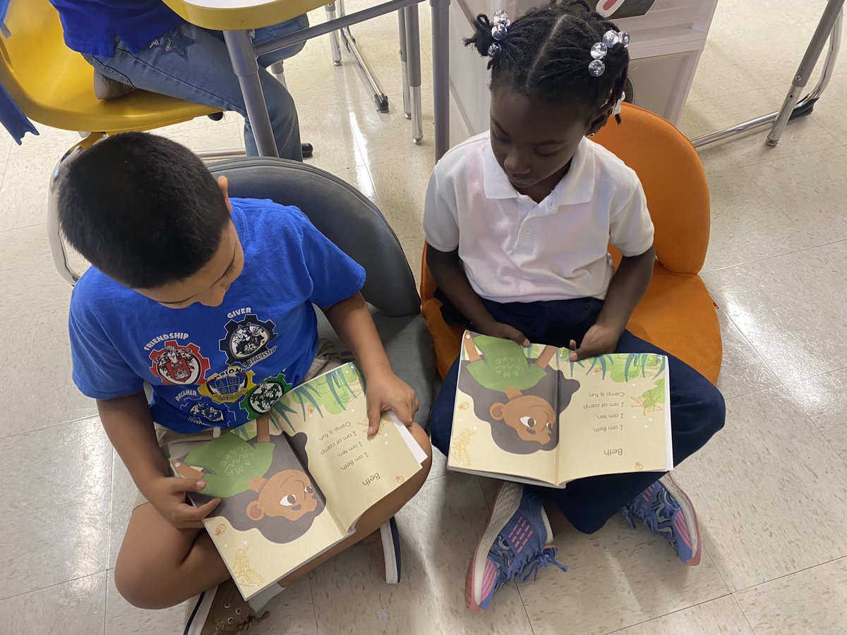 Practicing reading our decodable texts this morning both independently and with a partner! Champion readers in the making! #houseofchampions