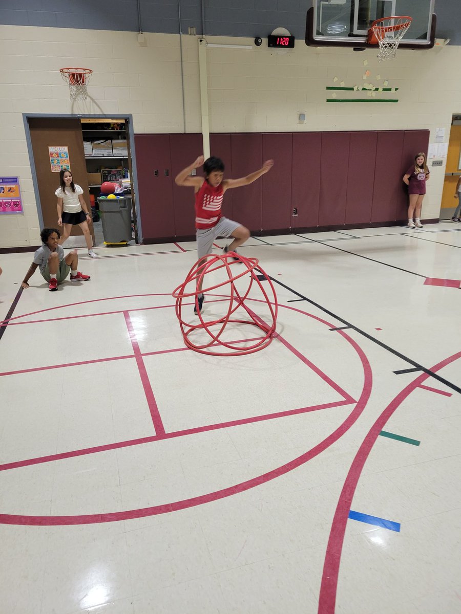 MsZarzycki27's tweet photo. 5th grade taking on the bonus Hula Hut challenge - jump over without knocking it down.  #PE #PhysEd #PhysicalEd https://t.co/97gAeWtf2k