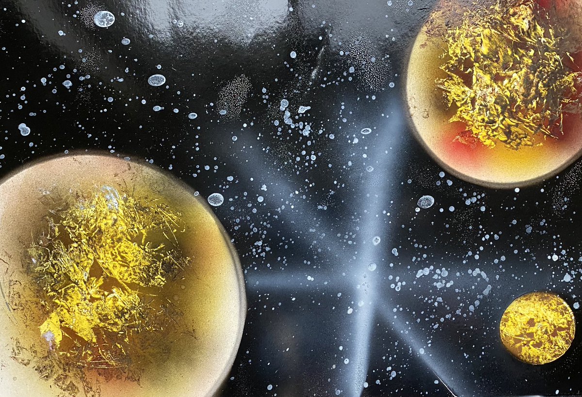 WMS 7th grade semester students master visual balance when creating solar themed images using spray paint.