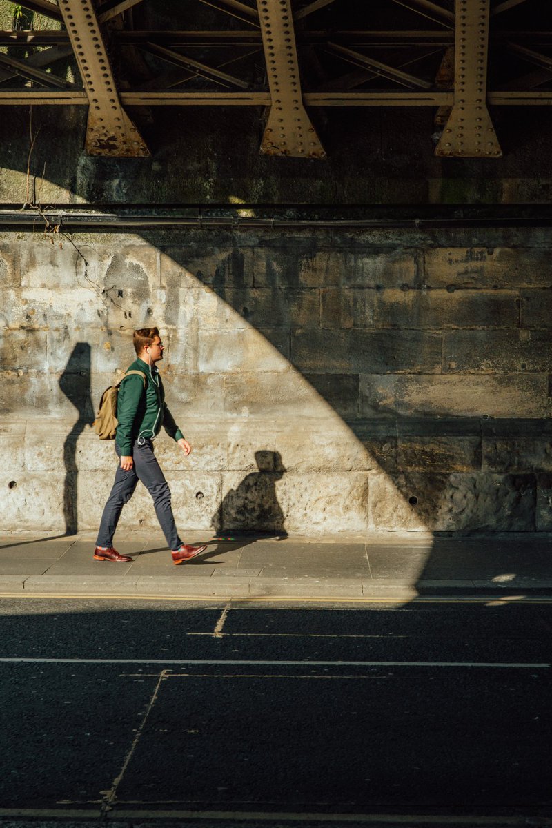 looptheloop5005's tweet image. Man walking with shadows by Darkneon
