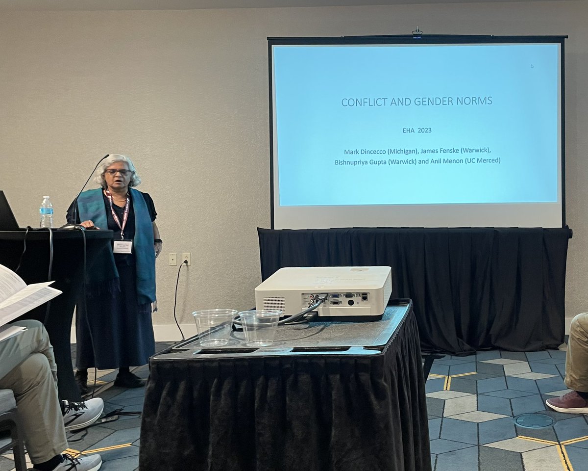 The third speaker in the Institutions and Culture session, Bishnu Gupta presenting research on conflict and gender norms in India