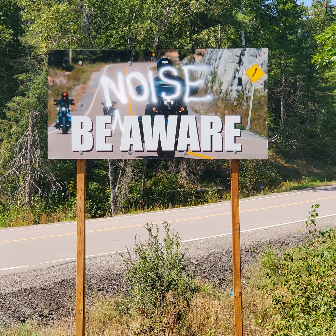 The County of Renfrew is disappointed by the discovery of graffiti on a safety message sign on CR 65 (Centennial Lake Rd) in Greater Madawaska. Th sign was installed to remind both motorcyclists &amp; motorists alike to “Be Aware” of each other when travelling the winding road.