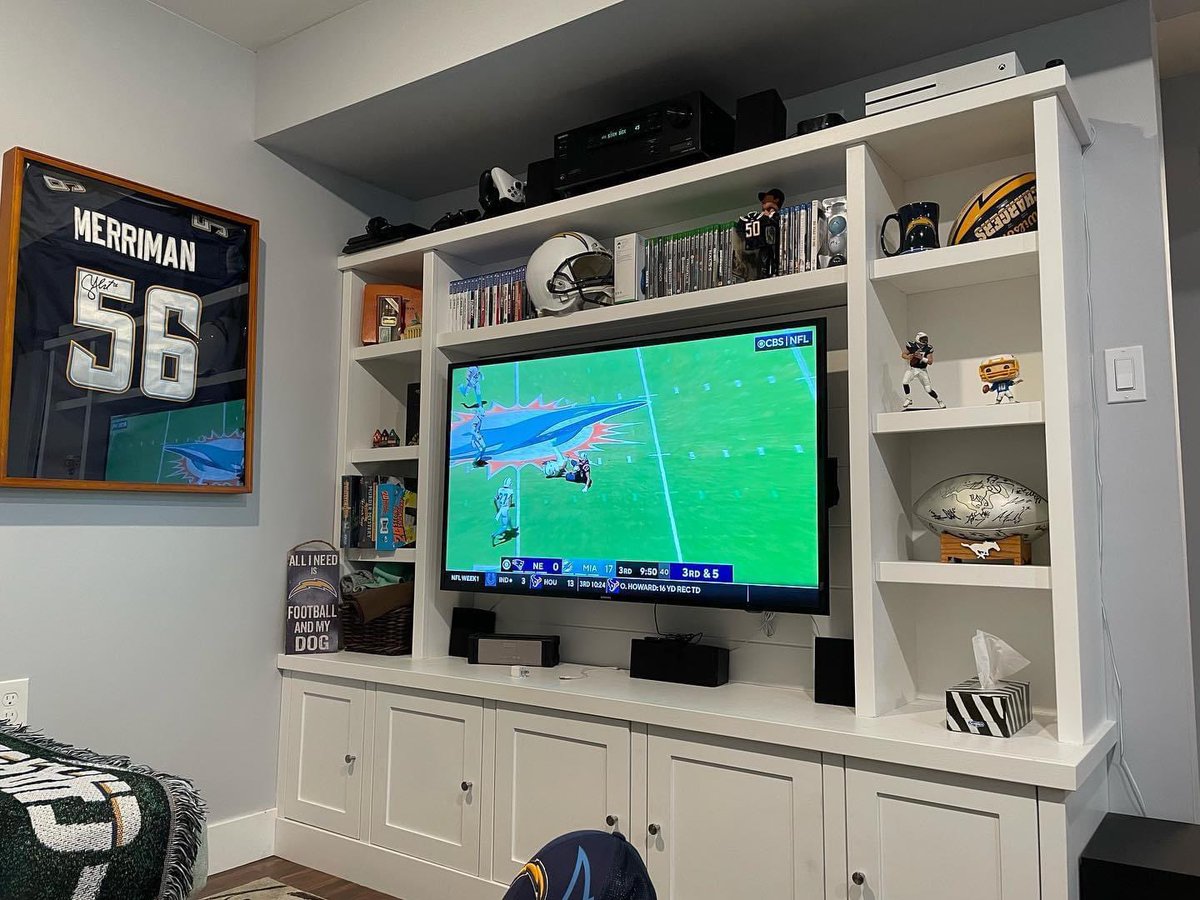 OhThurbs's tweet photo. Saddest part about moving is taking down the @chargers cave BUT @AustinEkeler I managed to snag you third overall in FF! (Pumped!). Need to get your autographed jersey on the wall next! May the Bolts pay you handsomely when they realize you are THE MAN! Let’s go! Bolt up! https://t.co/KaKfyjLSbu